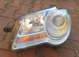 Фара левая Touran 2003-2015