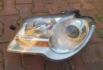 Фара левая Touran 2003-2015