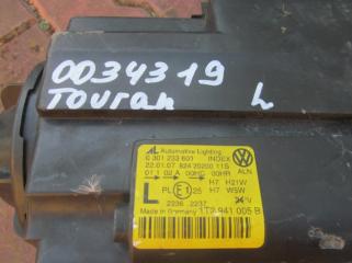 Фара левая Touran 2003-2015