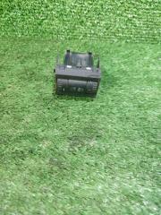 Запчасть кнопка корректора фар Skoda Octavia