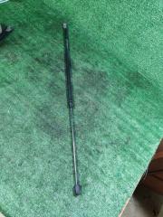 Фото запчасти амортизатор капота Cadillac DeVille 2000 Б/У запчасть Запчасть амортизатор капота Cadillac DeVille 2000