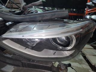 Фара ксеноновая левая BMW 1