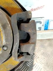 Запчасть суппорт задний левый Land Rover Discovery 3