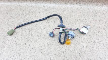 Запчасть патрон лампочки задний Suzuki Ignis 2002-2003