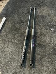 Фото запчасти амортизатор капота BMW X1 2014 контрактная запчасть Запчасть амортизатор капота BMW X1 2014