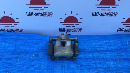 Суппорт передний левый TOYOTA AQUA