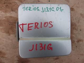 Запчасть лючок бензобака DAIHATSU TERIOS J131G EF Б/У Лючок бензобака DAIHATSU TERIOS J131G EF Б/У