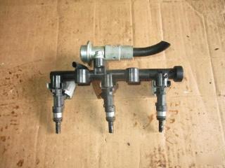 Инжектор  DAIHATSU   MIRA E:S   LA300S   KF   23250B2050  2 ракурс