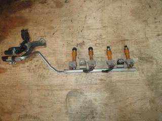 Инжектор  SUBARU   STELLA   RN1   EN07   2975000110  2 ракурс