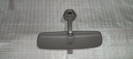 Запчасть зеркало заднего вида салонное Nissan Bluebird 1999