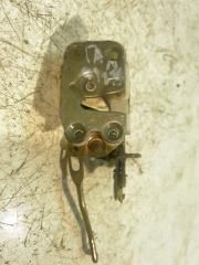 Запчасть замок двери задний левый Mitsubishi Galant 1991