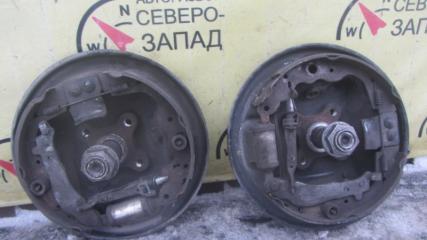 Механизм стояночного тормоза правый Nissan Almera