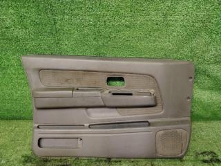 Фото запчасти обшивка двери передняя левая Nissan NP300 2011 Б/У запчасть Запчасть обшивка двери передняя левая Nissan NP300 2011