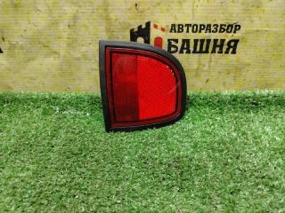 Запчасть катафот левый Mitsubishi L200 2011