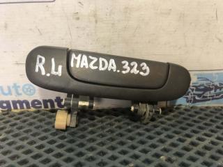 Фото запчасти ручка двери нaружная задняя левая Mazda 323 1998 Б/У запчасть Запчасть ручка двери нaружная задняя левая Mazda 323 1998