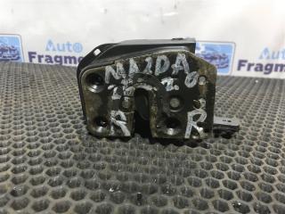 Фото запчасти замок двери задний правый Mazda 626 1992 Б/У запчасть Запчасть замок двери задний правый Mazda 626 1992