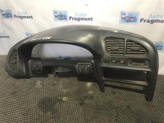 Запчасть накладка панели приборов Mazda 323 1996