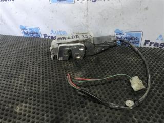 Запчасть замок двери передний правый Mazda 323 1996
