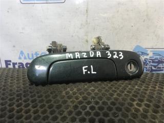 Ручка двери нaружная передняя левая MAZDA 323 2003 Б/У Ручка двери нaружная передняя левая MAZDA 323 2003