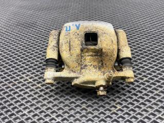 Суппорт тормозной передний левый Toyota Cresta 1993