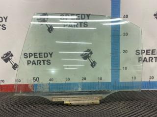 Стекло двери заднее левое Toyota Carina 1998