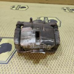 Суппорт передний правый Nissan Xtrail 2009