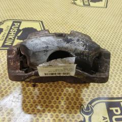 Суппорт передний правый Nissan Xtrail 2009