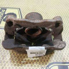 Суппорт передний правый Nissan Xtrail 2009