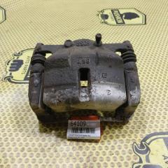 Суппорт передний левый Nissan Xtrail 2009