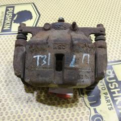 Суппорт передний левый Nissan Xtrail 2009