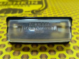 Фото запчасти подсветка номера правая Nissan Tiida 2008 Б/У запчасть Запчасть подсветка номера правая Nissan Tiida 2008