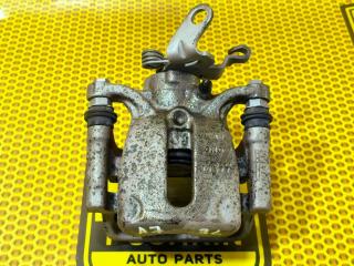 Суппорт задний левый Skoda Octavia 2014