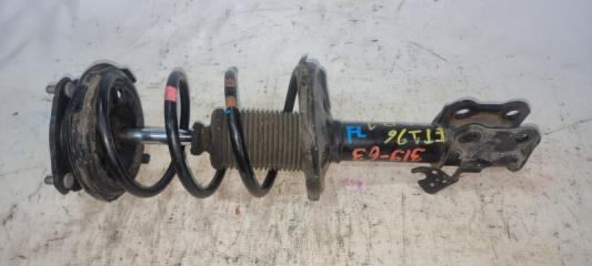 Запчасть стойка передняя левая TOYOTA CALDINA