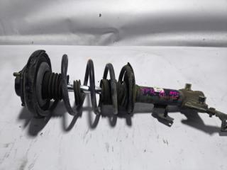 Запчасть стойка передняя левая NISSAN PRIMERA