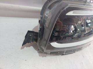 Фара левая DAIHATSU TANTO LA660S 100-69074 2 ракурс