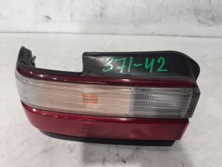 Стоп-сигнал левый TOYOTA COROLLA AE100 12-402 2 ракурс