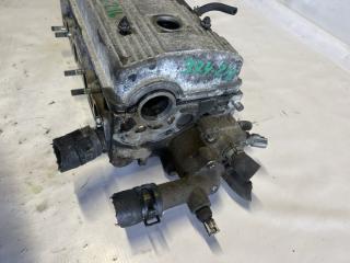 Головка блока цилиндров TOYOTA COROLLA SPACIO AE111 4A-FE 4 ракурс Головка блока цилиндров TOYOTA COROLLA SPACIO AE111 4A-FE 4 ракурс