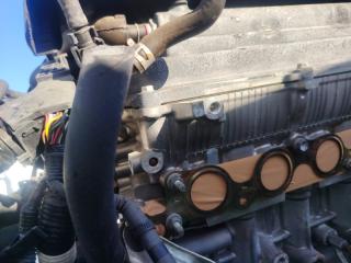 Двигатель TOYOTA COROLLA AXIO NZE141 1NZ-FE 5 ракурс Двигатель TOYOTA COROLLA AXIO NZE141 1NZ-FE 5 ракурс