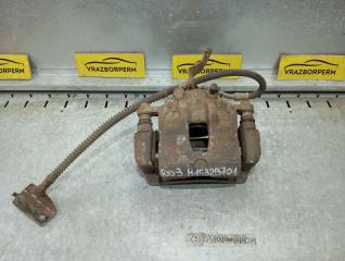 Суппорт тормозной передний левый Kia Rio