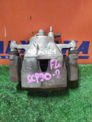 Суппорт передний левый TOYOTA VITZ 07.2010