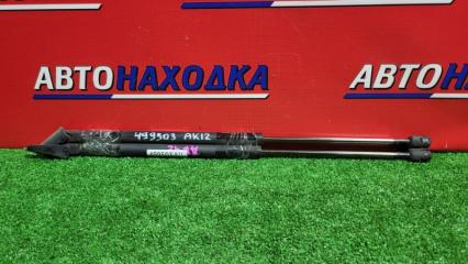 Амортизатор багажника задний NISSAN MARCH 2002-2010