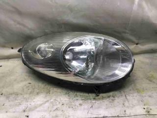 Фото запчасти фара левая Nissan Micra 2006 контрактная запчасть Запчасть фара левая Nissan Micra 2006