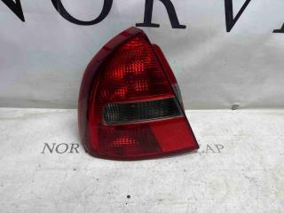 Фото запчасти фонарь задний левый Mitsubishi Carisma 2004 контрактная запчасть Запчасть фонарь задний левый Mitsubishi Carisma 2004