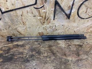 Фото запчасти амортизатор капота Audi Q7 2012 контрактная запчасть Запчасть амортизатор капота Audi Q7 2012