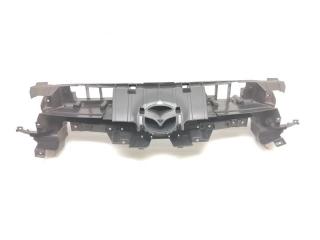 Запчасть кронштейн решетки радиатора Mazda 3 2013