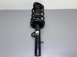 Стойка амортизатора передняя правая Geely Atlas