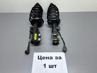 Стойка амортизатора передняя левая Geely Emgrand