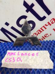 Фото запчасти эмблема задняя MITSUBISHI Lancer 2006 Б/У запчасть Запчасть эмблема задняя MITSUBISHI Lancer 2006