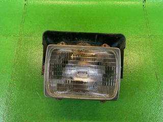 Запчасть фара передняя левая NISSAN CARAVAN 1996