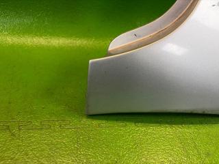 Накладка на крыло левая передняя TOYOTA IST NCP65 1NZ-FE 75602-52020-B0, 75602-52020 2 ракурс